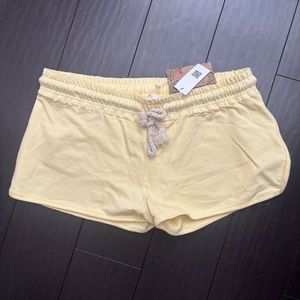 NWT Daybreak soft yellow cotton drawstring dolphin shorts size M